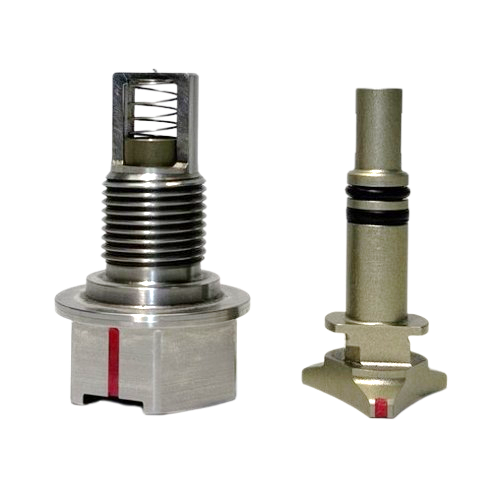 Photograph of magnetic chip collector plugs